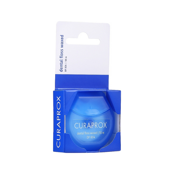 Зубна нитка з м'ятним смаком Curaprox Dental Flos Waxed DF 834 50 м - фото №1